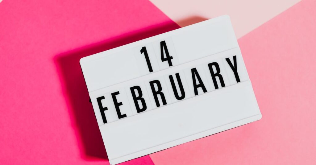 Stylish Valentine's Day message on February 14 with pink background.