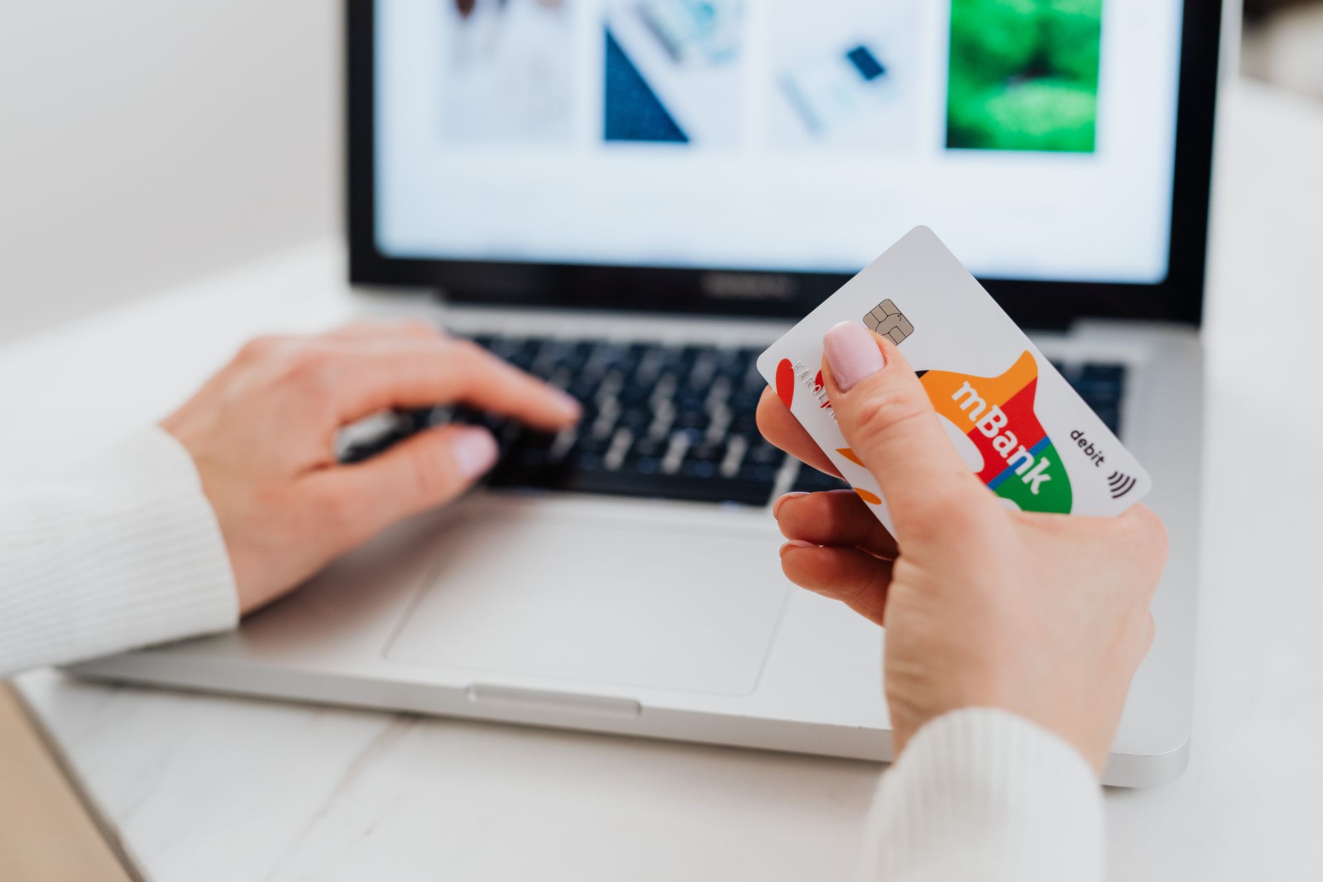 US bank debit card and laptop