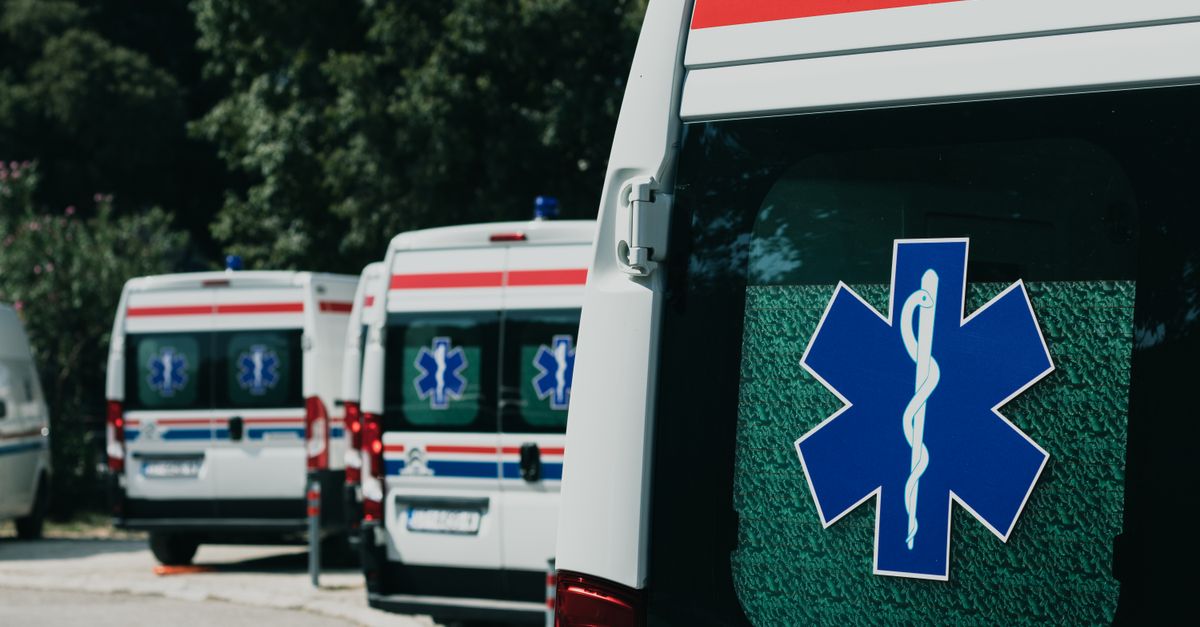 Three ambulances parked outdoors, ready for emergency healthcare situations.